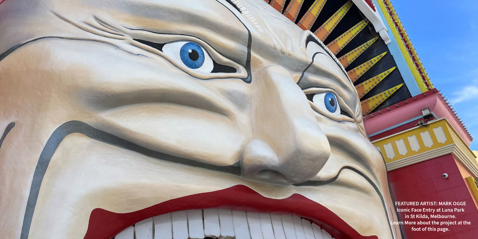 Iconic Luna Park face in St Kilda, Melbourne, restored with Viponds paints, featuring artist Mark Ogge.